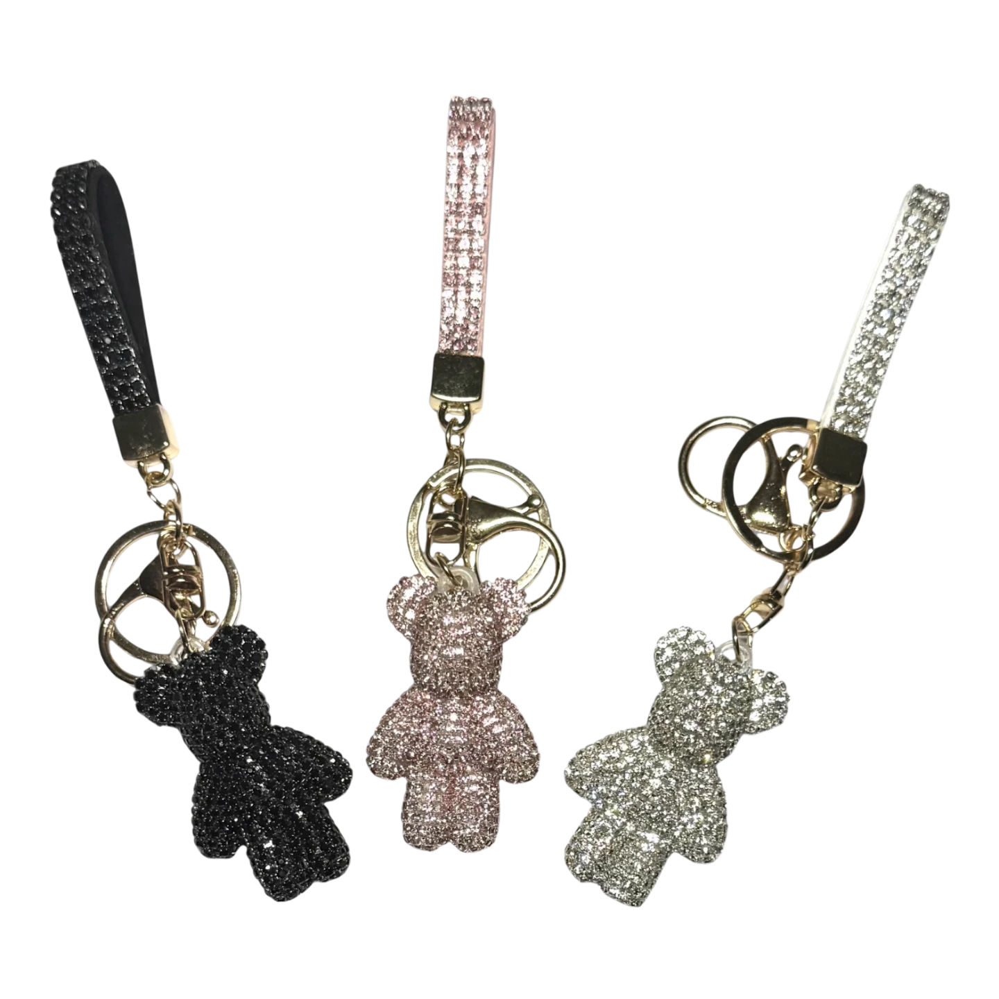 Three rhinestone teddy bear keychains in silver, pink and black
